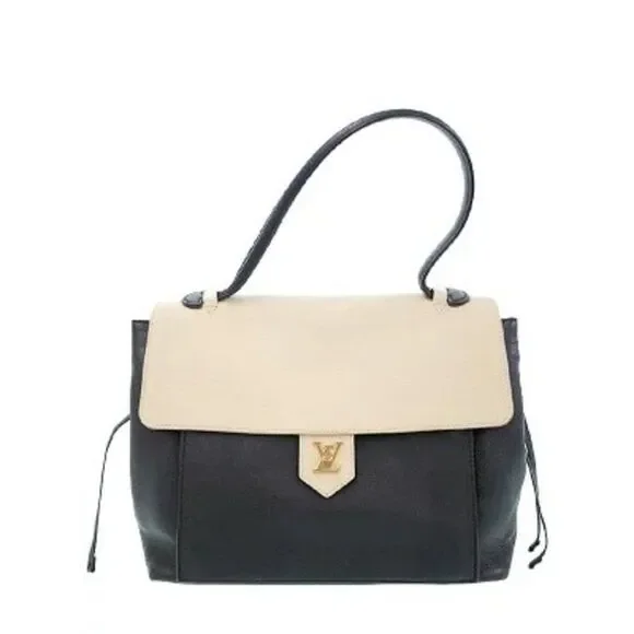 Louis Vuitton Lock Me MM Handbag - Picture 1 of 9